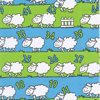 Gift wrapping paper counting sheep blue and green on strong white paper.
 